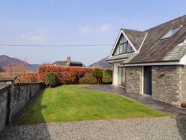 A house with a garden and pathway at Lakes View in Keswick