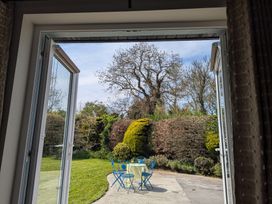An outdoor area with a table and chairs at The Stable in Swords, County Dublin