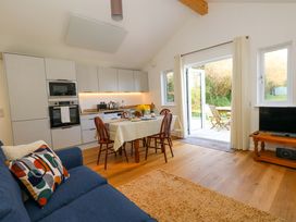 A kitchen with table and chairs in The Pebble, Dorchester