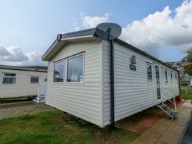 A mobile home with a satellite dish at Valley 36 in Kingsbridge