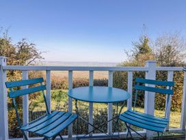 A table and chairs with a view at 2 Oak Tree Cottages Marshwood Nr. Hawkchurch