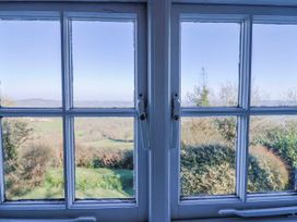 A window view of countryside at 2 Oak Tree Cottages Marshwood Nr. Hawkchurch