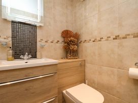 A bathroom with a sink and toilet at Flat 1, 40 Hinderwell Lane