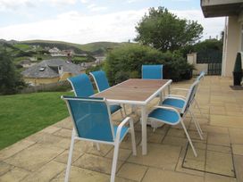 A table and chairs on the patio at Hope Cove near Kingsbridge