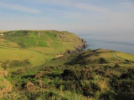 A landscape view of cliffs and sea at Hope Cove near Kingsbridge