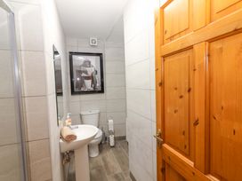 A bathroom with a sink and toilet at Macmathuna in Kilrush, County Clare