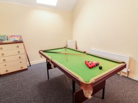 A snug with a pool table and games at Macmathuna in Kilrush, County Clare