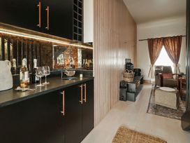 A snug area with a bar counter and seating at Hanowen House, Dungloe, County Donegal