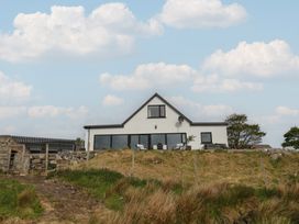 A house with windows and a satellite dish at Hanowen House Dungloe County Donegal