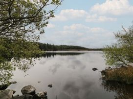 A body of water surrounded by trees and rocks at Hanowen House Dungloe, County Donegal