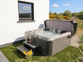 A hot tub with champagne and flutes at Hanowen House Dungloe, County Donegal