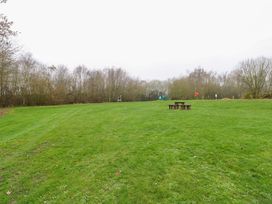 An outdoor area with a picnic table and trees in Great Yarmouth