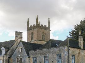 A church tower above a stone building at Paddock View Stow-On-The-Wold