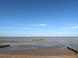 A view of the sea and beach at Ocean Breeze Escape in Allhallows