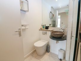 A bathroom with a sink and toilet at Mill Wharf in Berwick-upon-Tweed