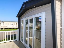 An exterior view of a holiday home with sliding doors at 0028 South Beach