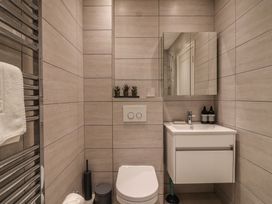 A bathroom with a sink and toilet at 3 The Elms Salcombe
