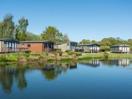Cabins by the lake at Tulip in Eardisland
