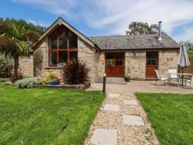 A house with a garden and pathway at Little Trethellan near Lanner