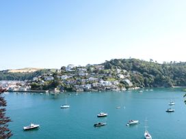 A view of a hillside with houses and boats in the water at Galvayne Dartmouth