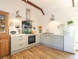 A kitchen with appliances and utensils at The Forge in Falmouth