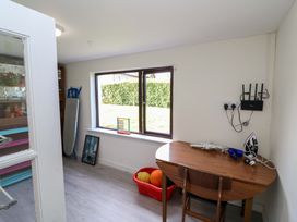 A utility room with a table and chair at Thadg and Hannah’s in Miltown