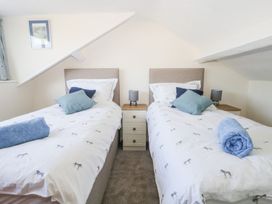 A bedroom with two beds at Yewbarrow in Seascale