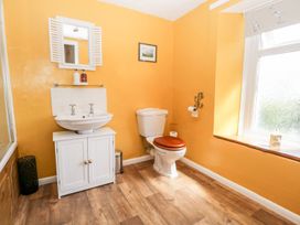 A bathroom with a sink and toilet at Yewbarrow in Seascale