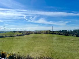 A landscape view with grass and telephone poles at Penpegws near Aberystwyth