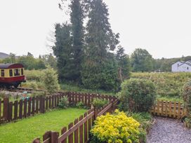 View of a train carriage and garden at 8 Railway Cottages Ulverston