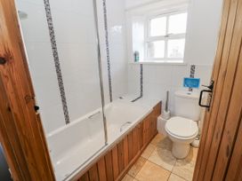 A bathroom featuring a bathtub and toilet at Swallows Rest in Hexham