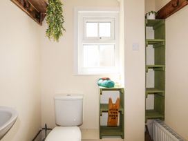 A bathroom with toilet and sink at Llys Elen in Caernarfon
