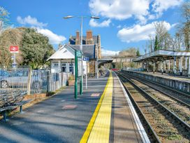 A train station with platforms and tracks at 40 Raleigh Court Sherborne