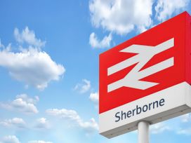 A sign for Sherborne station in Sherborne