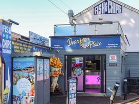 Dean's Place fish and chips takeaway with sign at Dawlish Warren