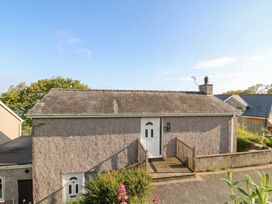 A house with a front door and steps at Bryn Y Felin in Y Felinheli
