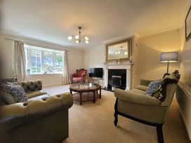 A living room with sofas and a coffee table at 16 Forth An Nance, Portreath