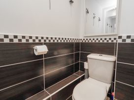 A bathroom featuring a toilet and toilet paper holder at 55 Meldon terrace Newbiggin-by-the-Sea