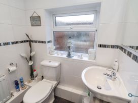 A bathroom with a toilet and sink at 55 Meldon terrace in Newbiggin-by-the-Sea