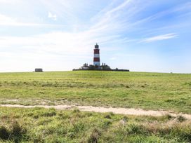 A lighthouse on a grassy field at The Ivy in Norwich