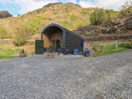 A house with outdoor seating and gravel area at Bluebelle - Crossgate Luxury Glamping in Hartsop
