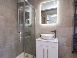 A bathroom with a shower and sink at The Four Views in Whitby