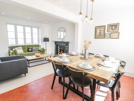 A dining room with a table set for dining at Ty Mawr Farm in Llanfairpwllgwyngyll