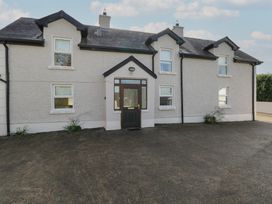 A house with windows and a door at Greenfield House in Aughavas