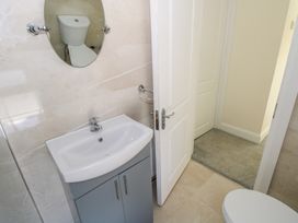 A bathroom with a sink and toilet at Greenfield House Aughavas County Leitrim