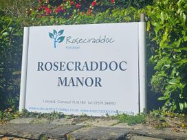 A sign for Rosecraddoc Manor in Liskeard Cornwall