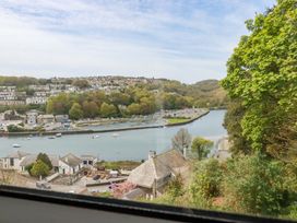 A view of a river with boats and houses from Flat 5 in Looe