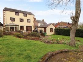 A house with a garden and steps at High Mill House in Penrith