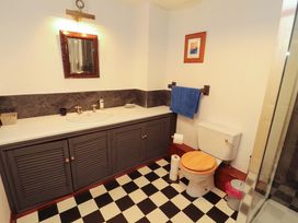 A bathroom with a sink and toilet at High Mill House in Penrith