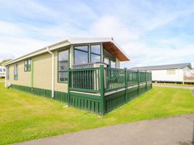A mobile home with a deck located at 37 Horizon Park in Hartlepool